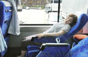 woman traveling by bus